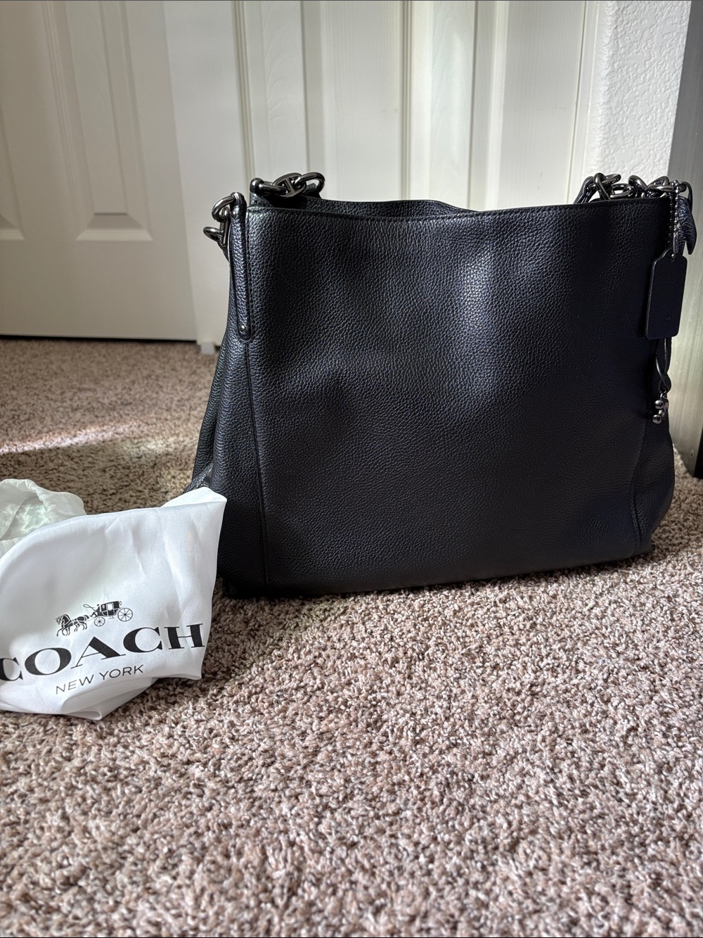 Coach Black Pebbled Leather Shoulder Bag with Chain Accents